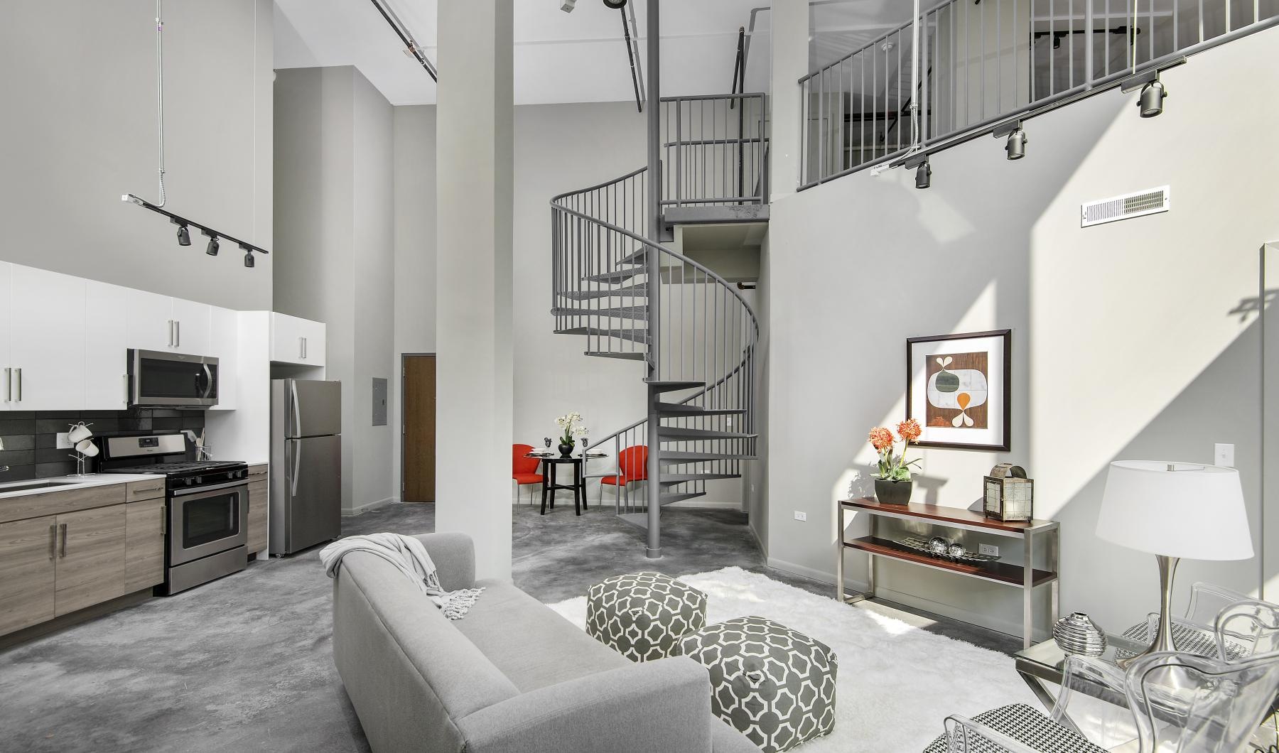 a living room with a staircase