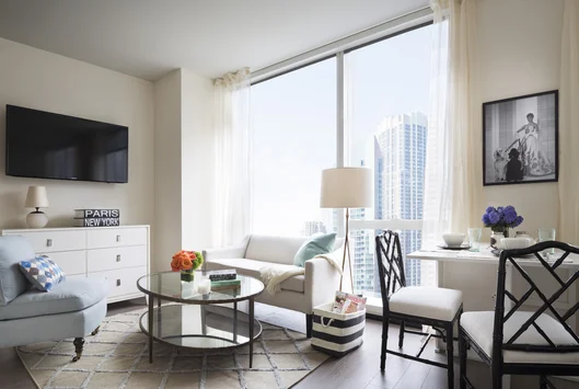 Custom-designed wide-plank wood flooring throughout residences