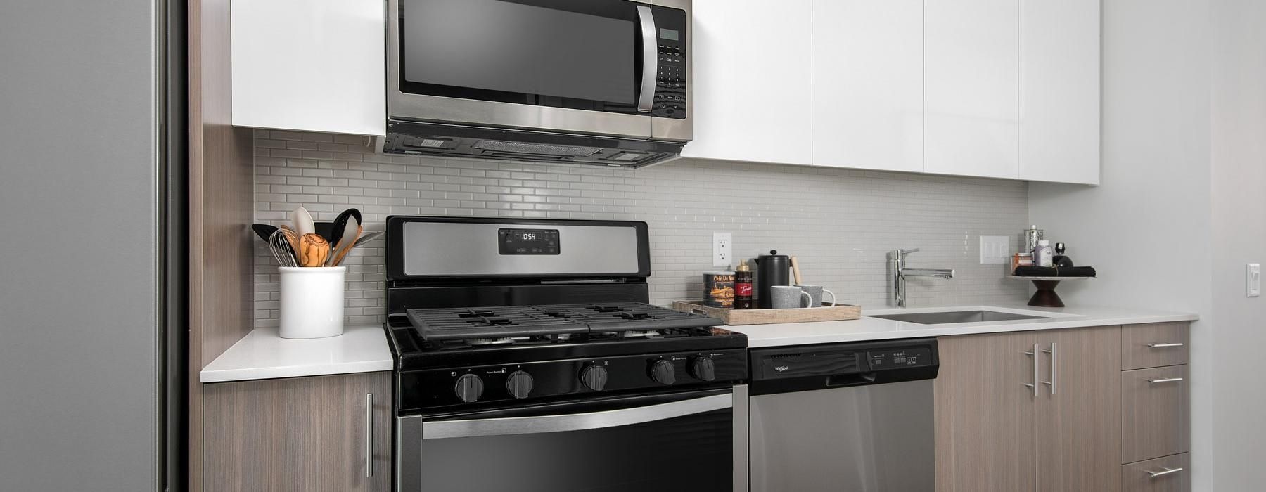 a kitchen with white cabinets